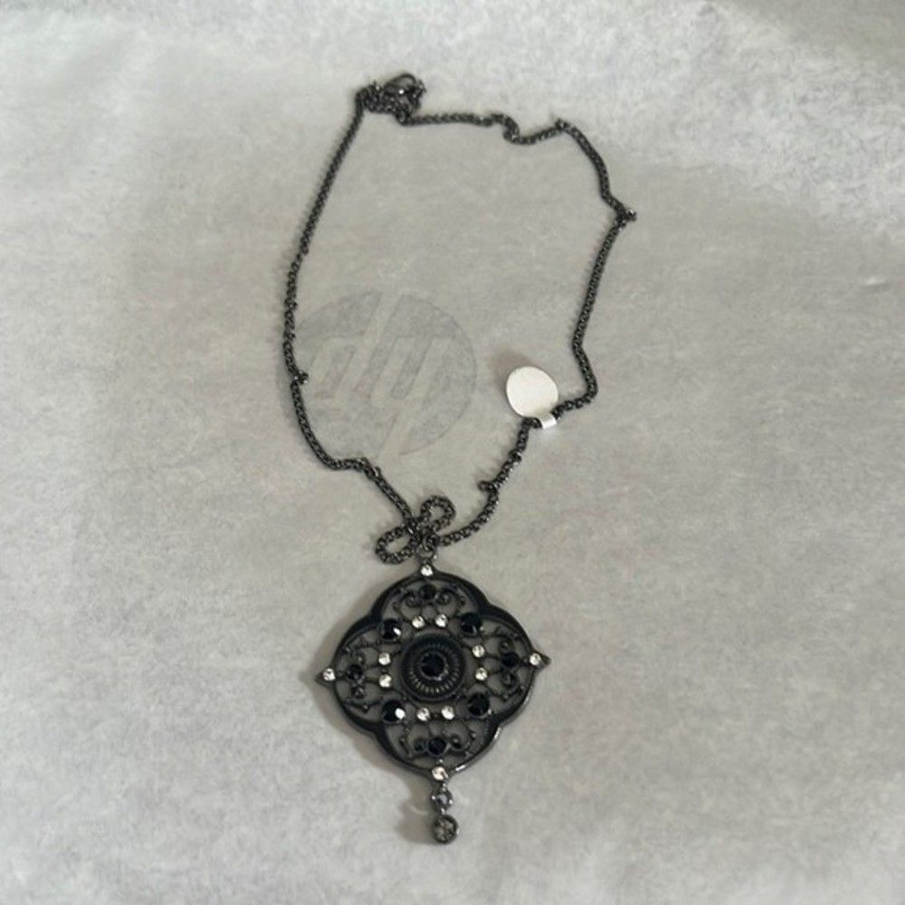 Handcrafted antique looking pendant on chain